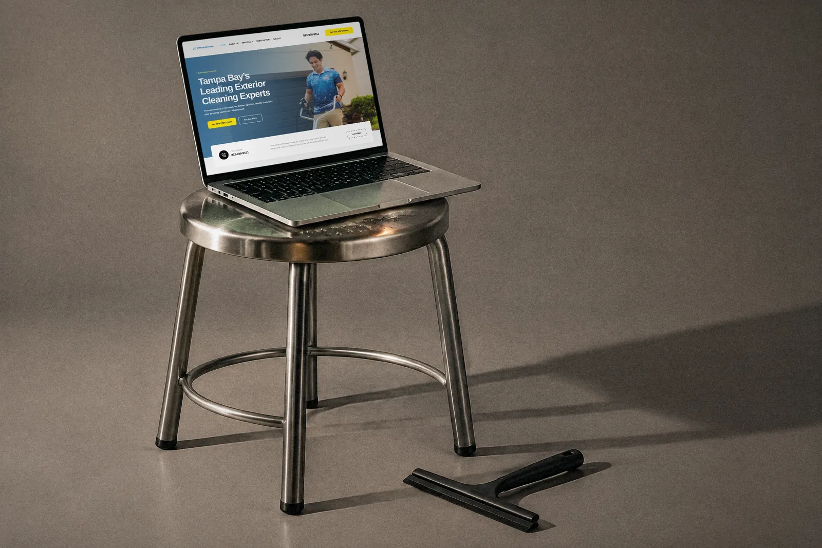 Shine On Solutions exterior cleaning website shown on a laptop